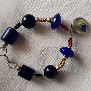 Red, silver and blue clasp homemade bracelet